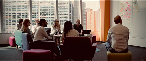 image of team members in meeting room
