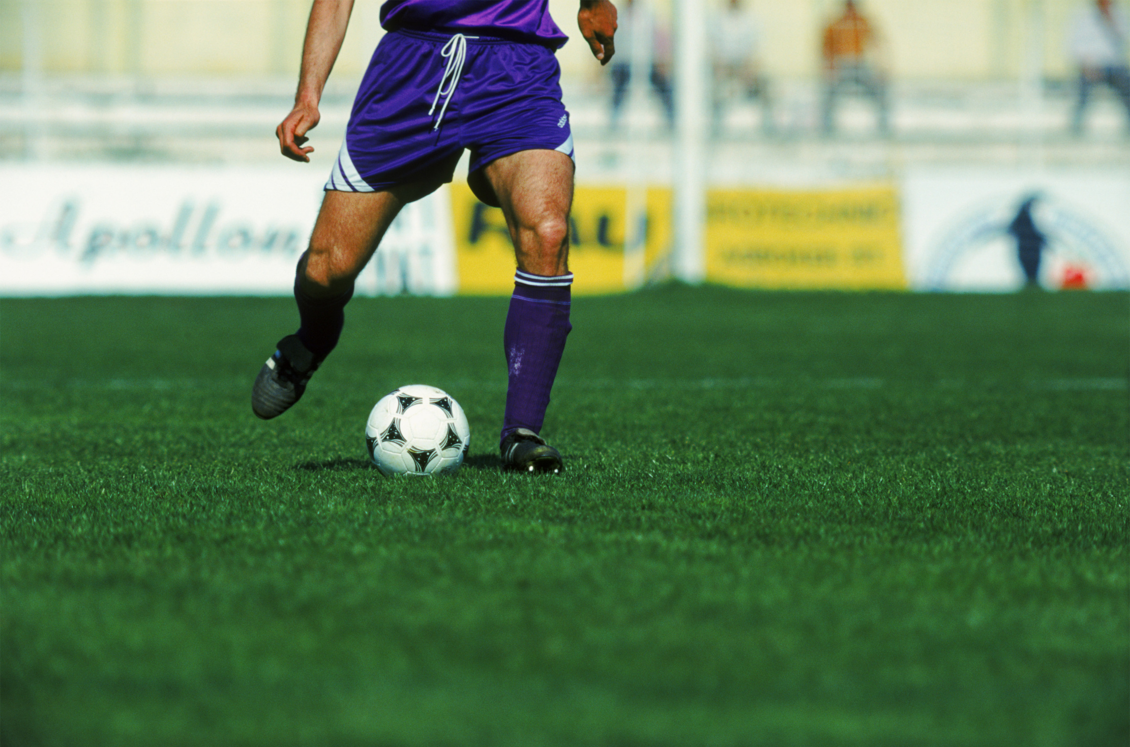 Football player on artificial turf