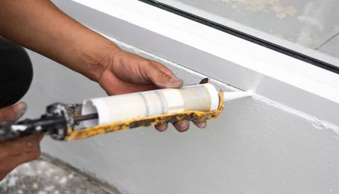 image of caulk being applied